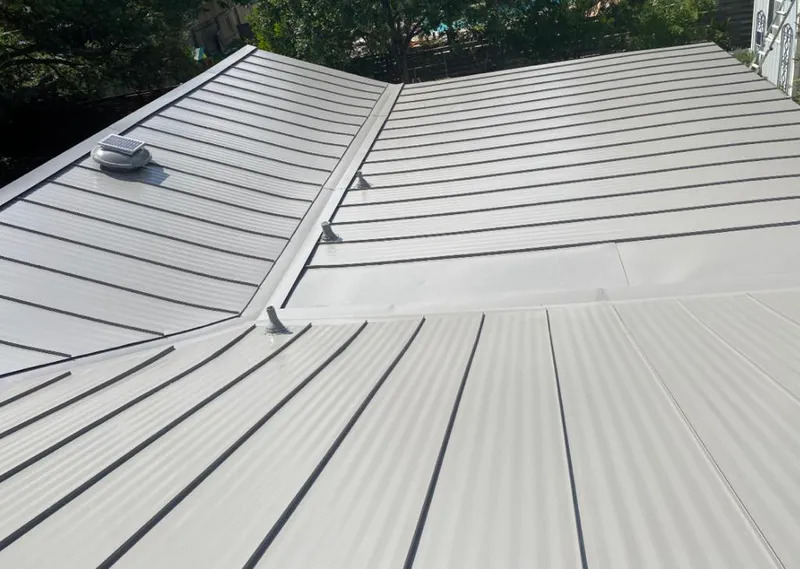 Solar attic fan installed on a metal roof for Roof Ventilation in Harker Heights